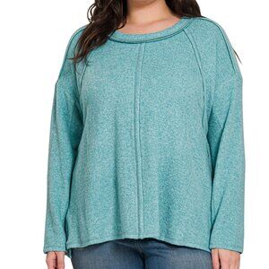 7. PLUS BRUSHED HACCI EXPOSED SEAM HI LOW SWEATER